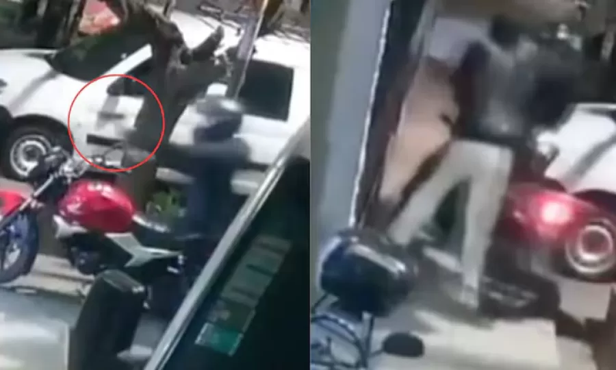 Le quisieron robar la moto y se colg&oacute; del delincuente para impedirlo